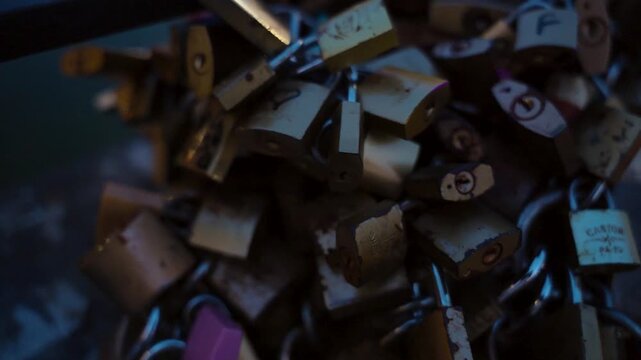 Close up of love padlocks on a bridge in Italy