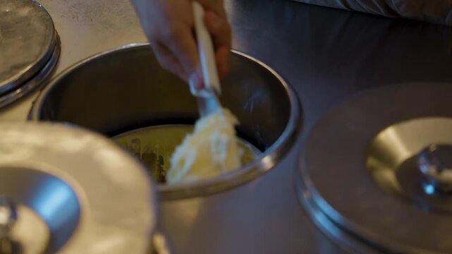 Barista in Italy making a perfect affogato
