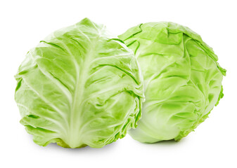 Fototapeta premium Young cabbage isolated on white. Two whole heads