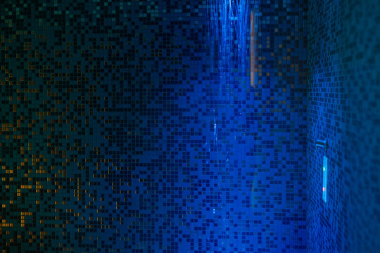 Emotional sensory shower with blue chromotherapy light in luxury spa wellness resort relaxation