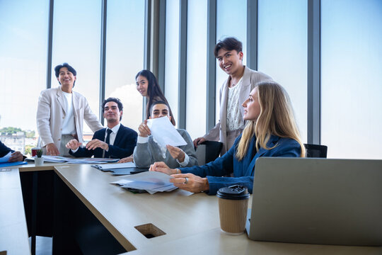 Successful happy workers Group of business people with Multiethnic workers with in company workers Group of asian business people and support Teamwork in the meeting room at modern office.