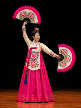 Traditional Korean Fan Dance Performer Wearing Hanbok