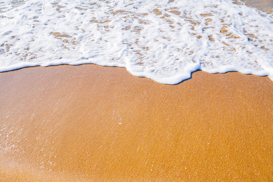 White Sea Foam Wave on Yellow Sandy Beach &mdash; Summer Coastal Background