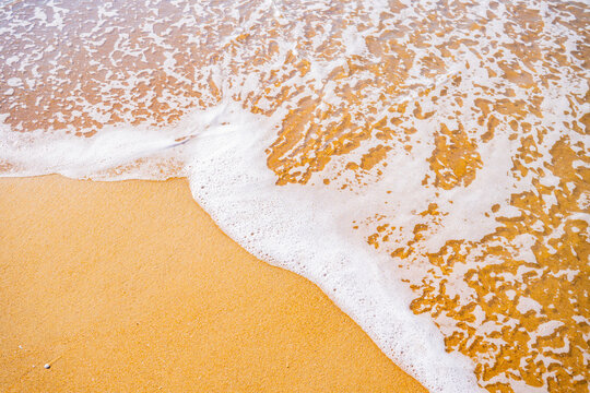 White Sea Foam Wave on Yellow Sandy Beach &mdash; Summer Coastal Background