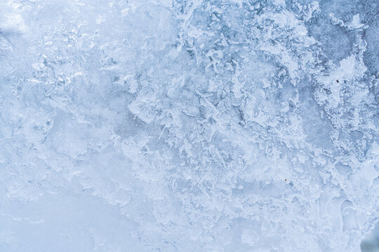 Abstract Blue Ice Texture Background with Frost Patterns in Winter