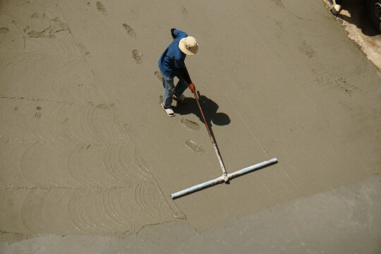 Outdoor Concrete Patio Construction with Floor Hardener