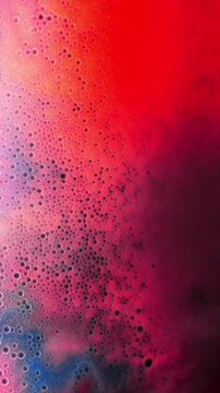 Abstract liquid bubbles floating in colorful fluid. High quality 4k footage