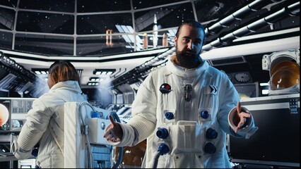 An astronaut waves during a video call with Earth command center and shares a mission update; a crew member salutes researchers through the communication link.