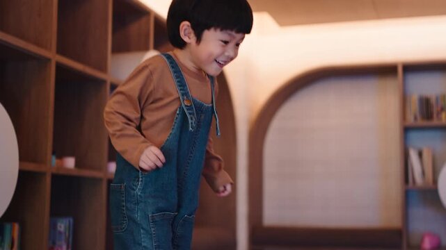 Energetic child bouncing indoors at home with a joyful smile
