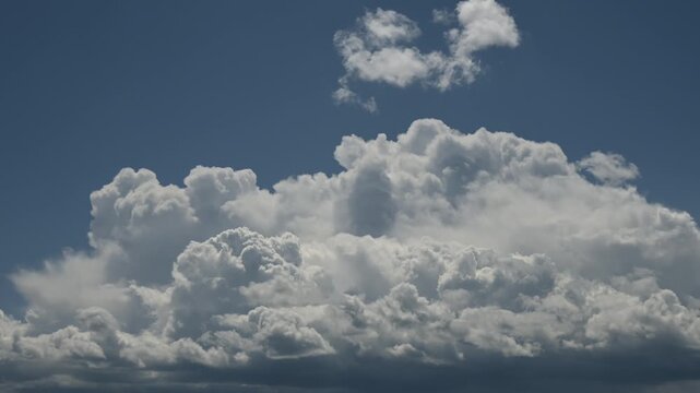 Dramatic timelapse storm clouds buid in a stormy sky
