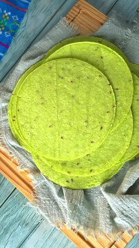 Healthy green nopal tortillas and fresh cactus pads, low-carb Mexican food. Rotating camera