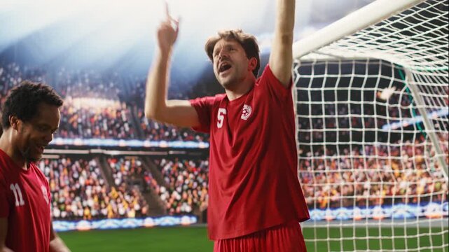 Football celebration after match winning goal as goal scorer raises arms, smiling and celebrating with clenched fists, excitement on pitch after final whistle, winning soccer game.
