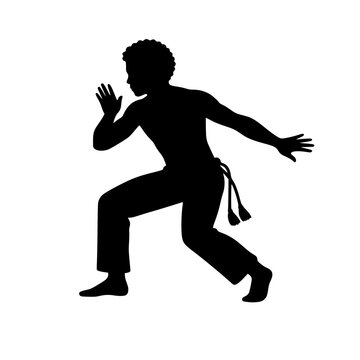 Silhouette of a Man Practicing Brazilian Capoeira Martial Art Dance