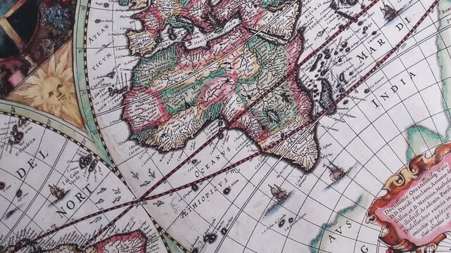 Panning close view of a modern printed reproduction of a 17th century world map by H. Hondius