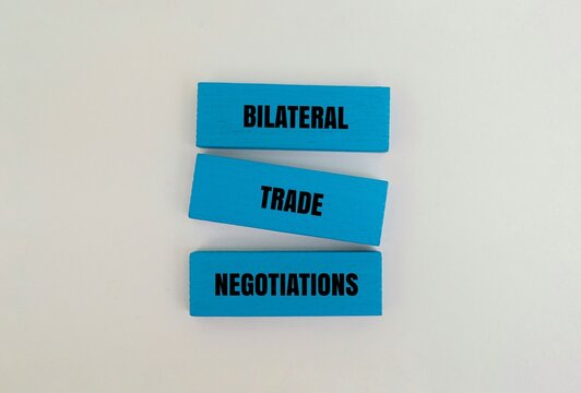 A coloured blocks with the text "BILATERAL TRADE NEGOTIATIONS". Global Economy and Geopolitics concepts