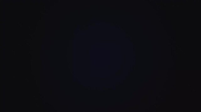 dark blue background featuring abstract faint light creating a minimalist black texture perfect for modern design and cosmic concepts.