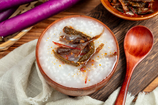 White congee with pickled eggplant