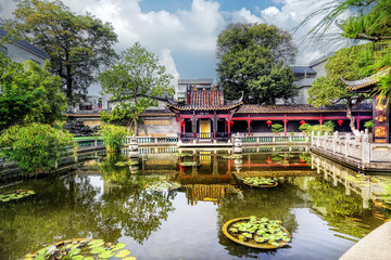 Naklejka premium Foshan, Guangdong, China. Bijiang Jinlou (Gold Tower) in Bijiang Village, Beijiao Town, Shunde, a historic Lingnan architectural complex with ancestral halls, residences and exquisite wood carvings.