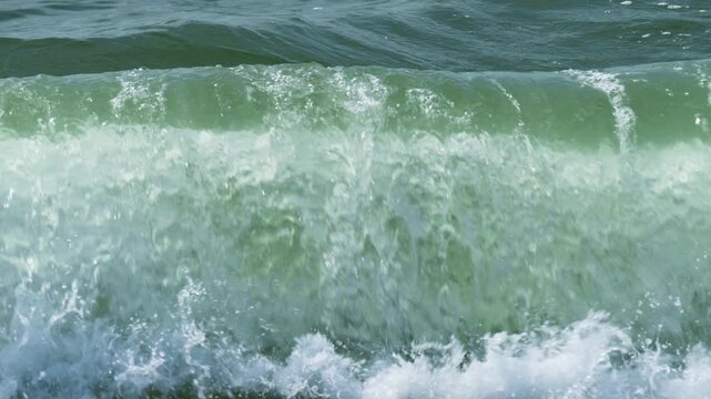 Slow motion footage of sea waves crashing on the shore