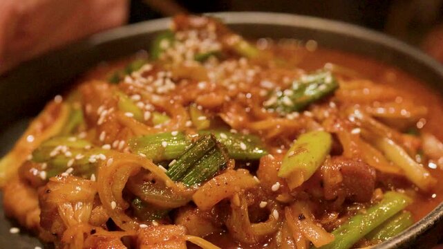 Spicy Korean Stir Fried Pork with Kimchi and Green Onions