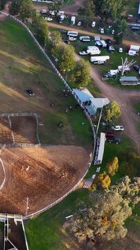 Aerial View of Horse Riding in a Rural Rodeo Arena