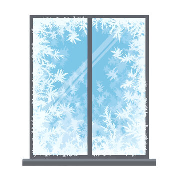 A frosted window pane with ice crystals on a blue background
