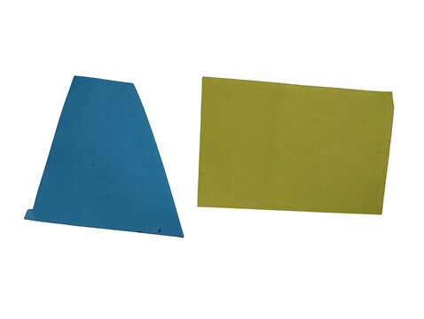 Blue trapezoid and green rectangle paper shapes on a flat surface isolated on transparent background