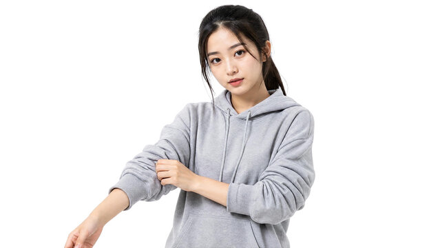 Portrait of a Young Asian Woman Adjusting Her Grey Hoodie Sleeve Isolated on Transparent Background
