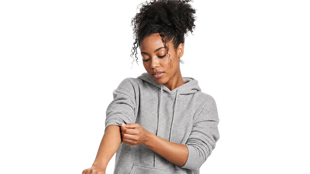 Young African American Woman Rolling Up Grey Hoodie Sleeve Isolated on Transparent Background