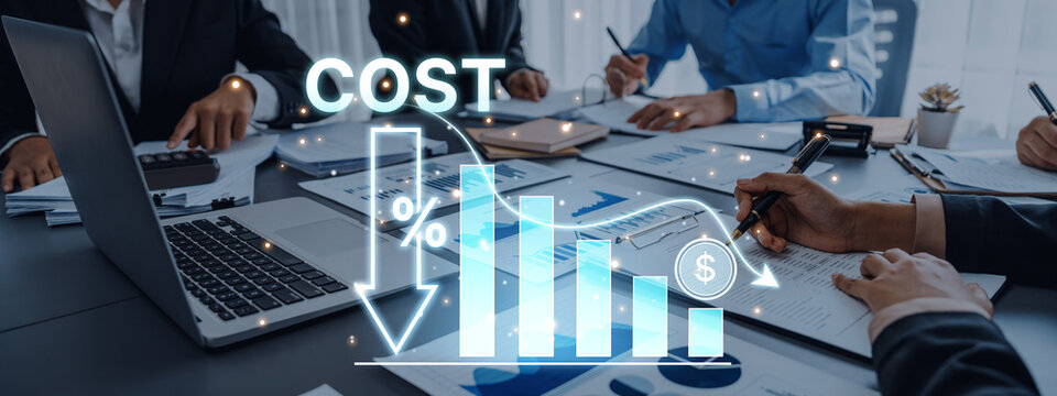 Business professionals collaboratively analyze financial data in a modern office, focusing on cost reduction and performance improvement with charts and graphs. Trope