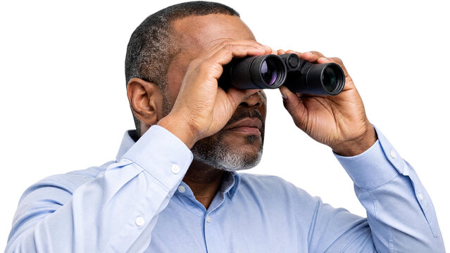 Focused Mature African American Businessman Looking Through Binoculars for Vision and Strategy