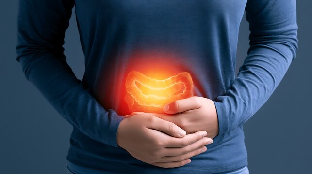 Person holding abdomen with a glowing intestinal area. Concept for digestive health, medical diagnosis, or chronic.