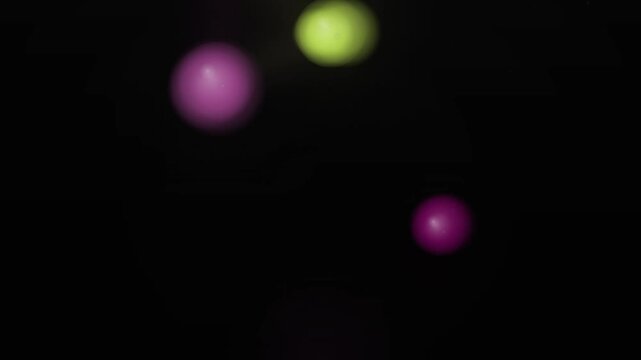 Abstract Glowing Spheres Floating in Dark Space.