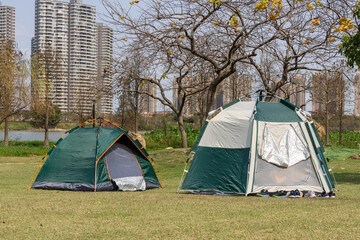 Camping tent in a city park © mei