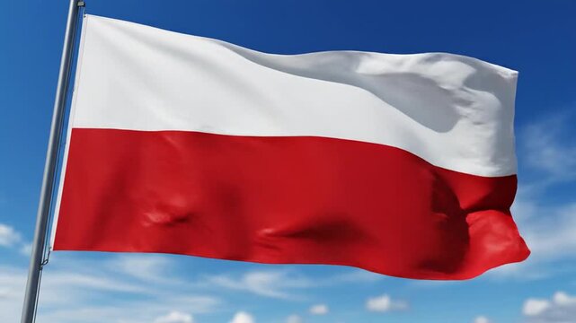 National flag of Poland waving against blue sky