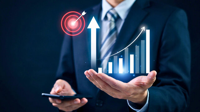 Businessman showing growing graph and target icon for business development, financial success, and strategic investment planning