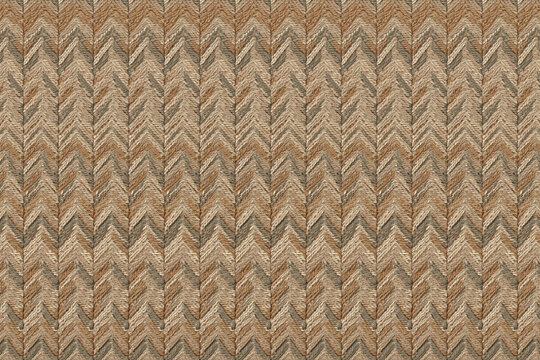Detailed close-up of a woven fabric texture featuring a repeating chevron pattern in shades of brown, tan, and grey earth tone colors