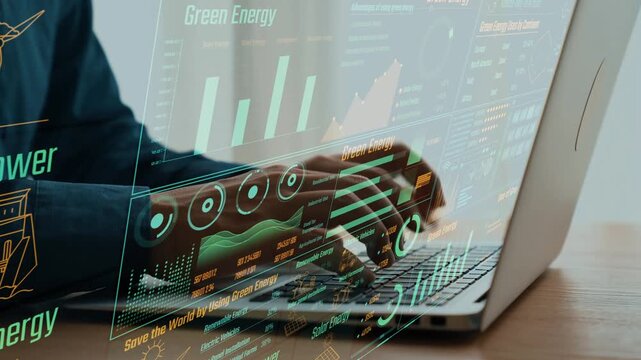 A focused individual engages with a laptop displaying green energy data visualizations, emphasizing renewable resources and their impact on sustainable technology. Cipher