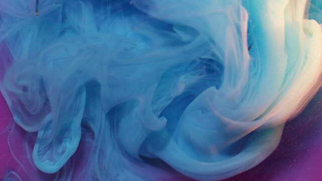Paint fog splash. Glitter neon mist. Defocused blue pink purple color broken glass cloud drop spreading on abstract bokeh background.