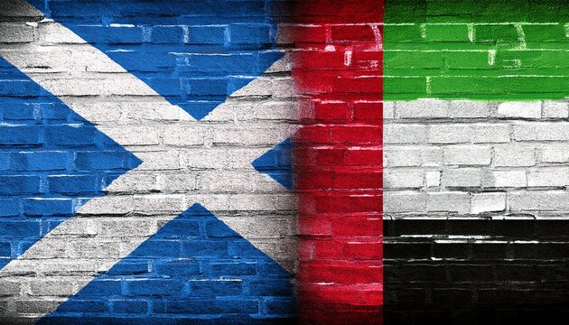 Scotland flag and UAE flag graffiti on brick wall