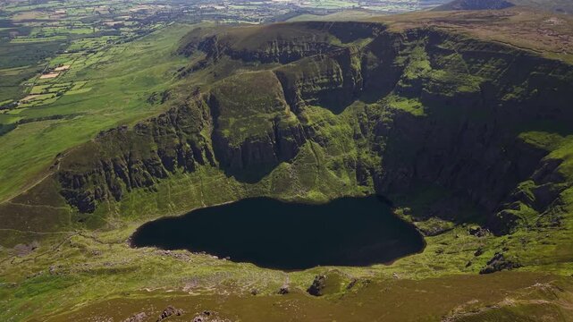 Scenic aerial of Coumshingaun glacial corrie and mountain lake, County Waterford