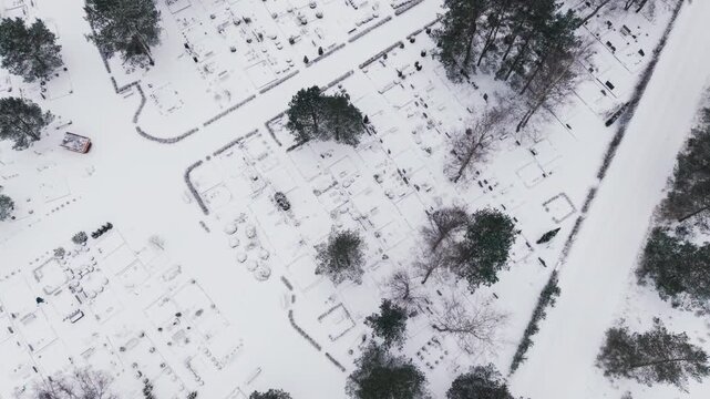 Top down drone rotates right above Smiltaju Cemetery in Tinuzi Parish, Latvia