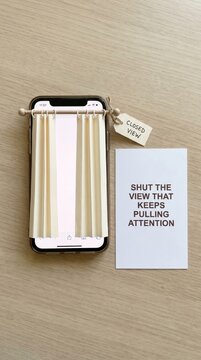 Smartphone with Curtains and Tag Promoting Digital Detox and Mindful Disconnect