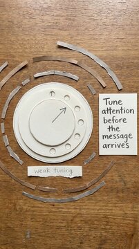 Vintage Radio Dial with "Tune Attention" Message, Perfect for Low Attention Span Audiences