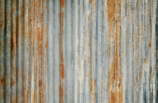 Old zinc wall texture background, rusty on galvanized metal panel sheeting.