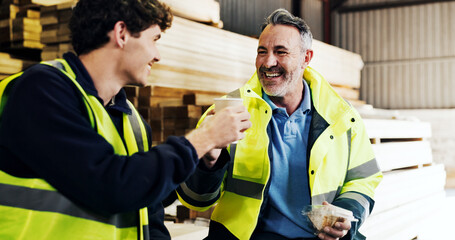 Woodwork, cheers or happy people with coffee for lunch break or rest together in carpentry workshop. Men, carpenter or contractor with smile, food or drink for social discussion or toast in warehouse