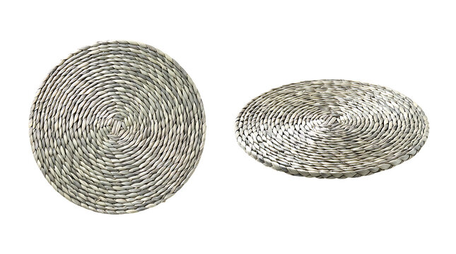Natural woven round placemat made of seagrass or wicker material for dining table protection featuring rustic texture and circular braided pattern eco friendly home kitchen accessory design.