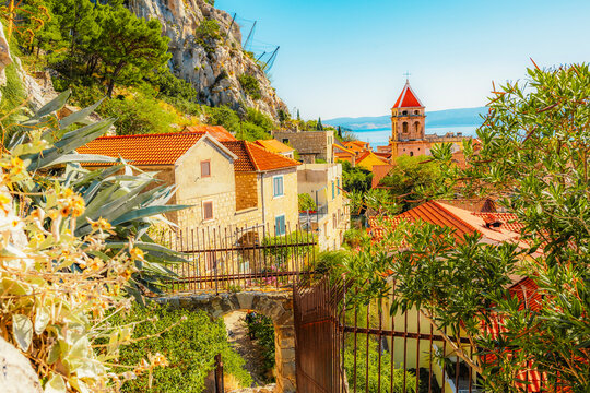 Omis old town and the Adriatic sea from the historic Mirabella fortress, terracotta roofs and the Cetina river in Croatia.