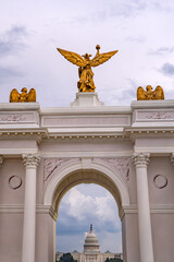 Obraz premium America 250 arch near Capitol. Patriotic America 250 arch landmark. Ceremonial America 250 arch entrance. America 250 arch honors freedom.