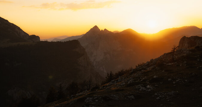 Sunset over the Maglic mountain massif seen from Prijevor saddle in Sutjeska National Park, the highest peak of Bosnia and Herzegovina at golden hour.